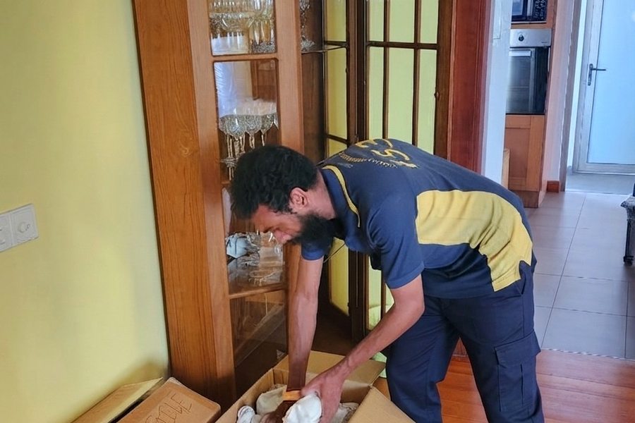 Family Movers crew packing household items